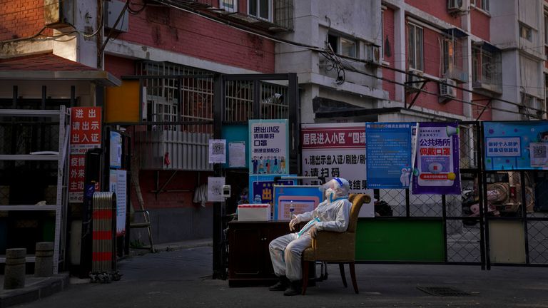 China expands lockdowns as COVID cases soar to daily record high