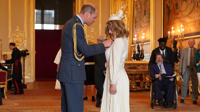 Kate Garraway joined by husband Derek Draper as she collects MBE from Prince William