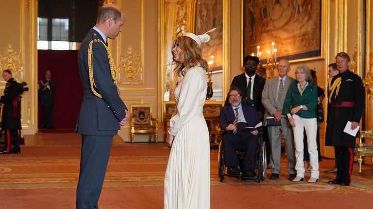 Kate Garraway joined by husband Derek Draper as she collects MBE from Prince William
