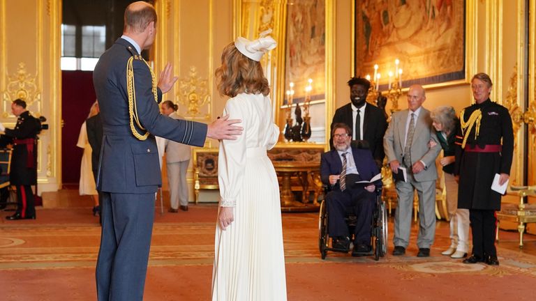 Kate Garraway joined by husband Derek Draper as she collects MBE from Prince William